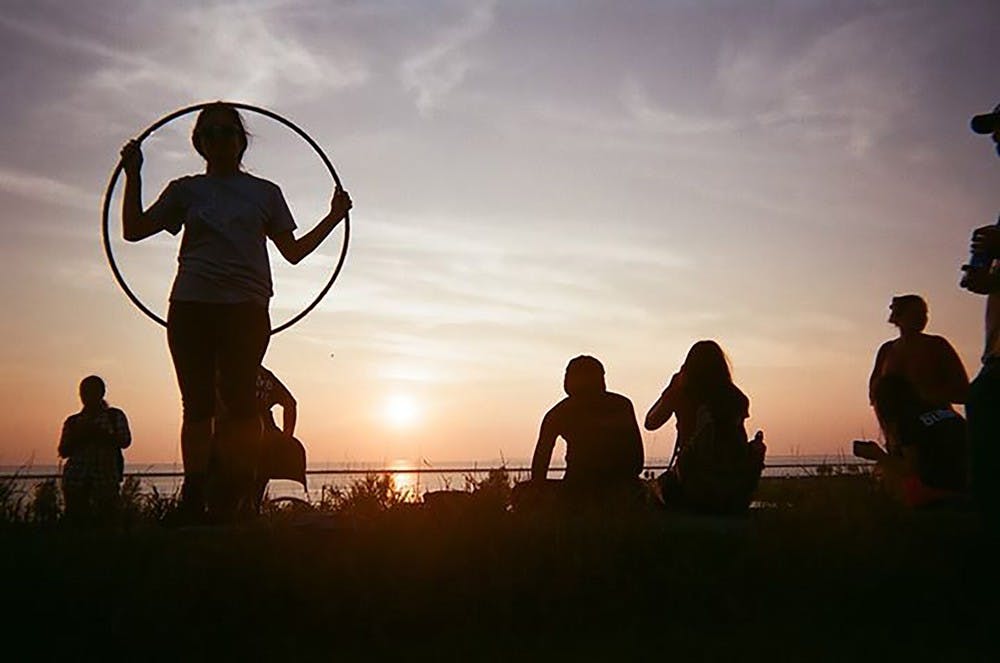 <p>Outdoor Adventure Club on a Florida beach. The group is traveling to Cayo Costa State Park, Florida this spring break where they’ll have no electronics, hot water, electricity, or housing.</p>