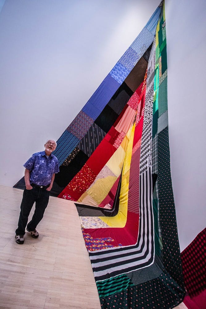 The Splitting Light exhibit opened at the Center for the Arts first floor Gallery on Thursday. The exhibit’s theme is the manipulation and construction of color and each installation deals with this theme in a different way. From 30 foot high, stitched together flags to shimmering copper bricks, the installations will available to see in the gallery until January.