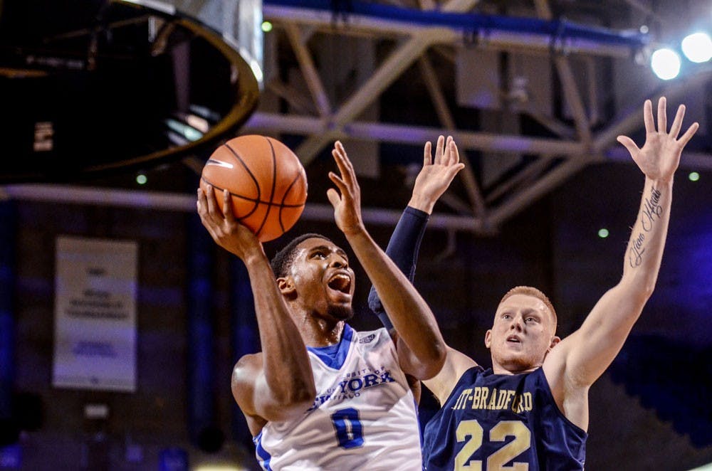 <p>Junior wing Blake Hamilton puts up a shot against Pittsburgh at Bradford at Alumni Arena in November. Hamilton had a career-high 22 points in a victory on the road against Miami Ohio Tuesday night.&nbsp;</p>