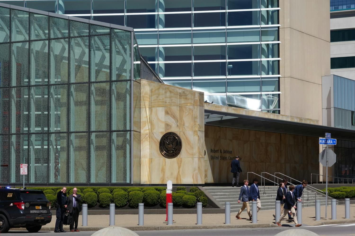 UB students walk past the Robert H. Jackson United States Courthouse after attending a hearing in YAF's lawsuit against the Student Association and UB officials on Friday, April 26, 2024.