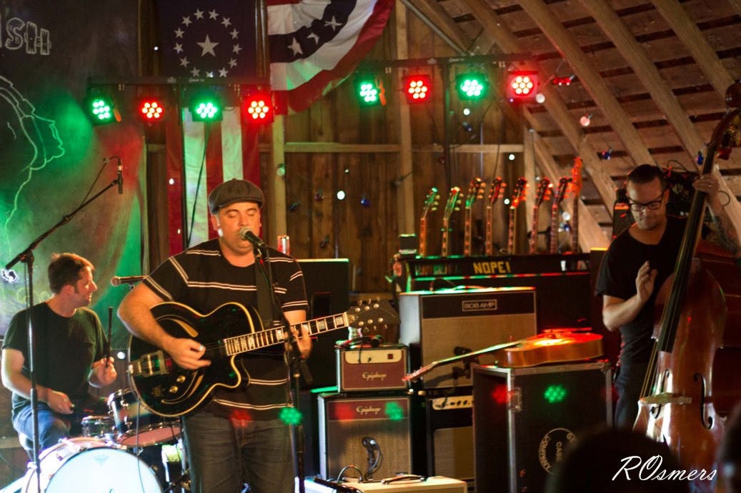 The Bellfuries perform in Codfish Hollow, Maquoketa, IA on July 4, 2014.