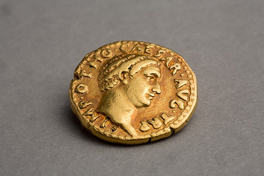 <p>Coins like this Roman coin were recently rediscovered in Lockwood library. </p>