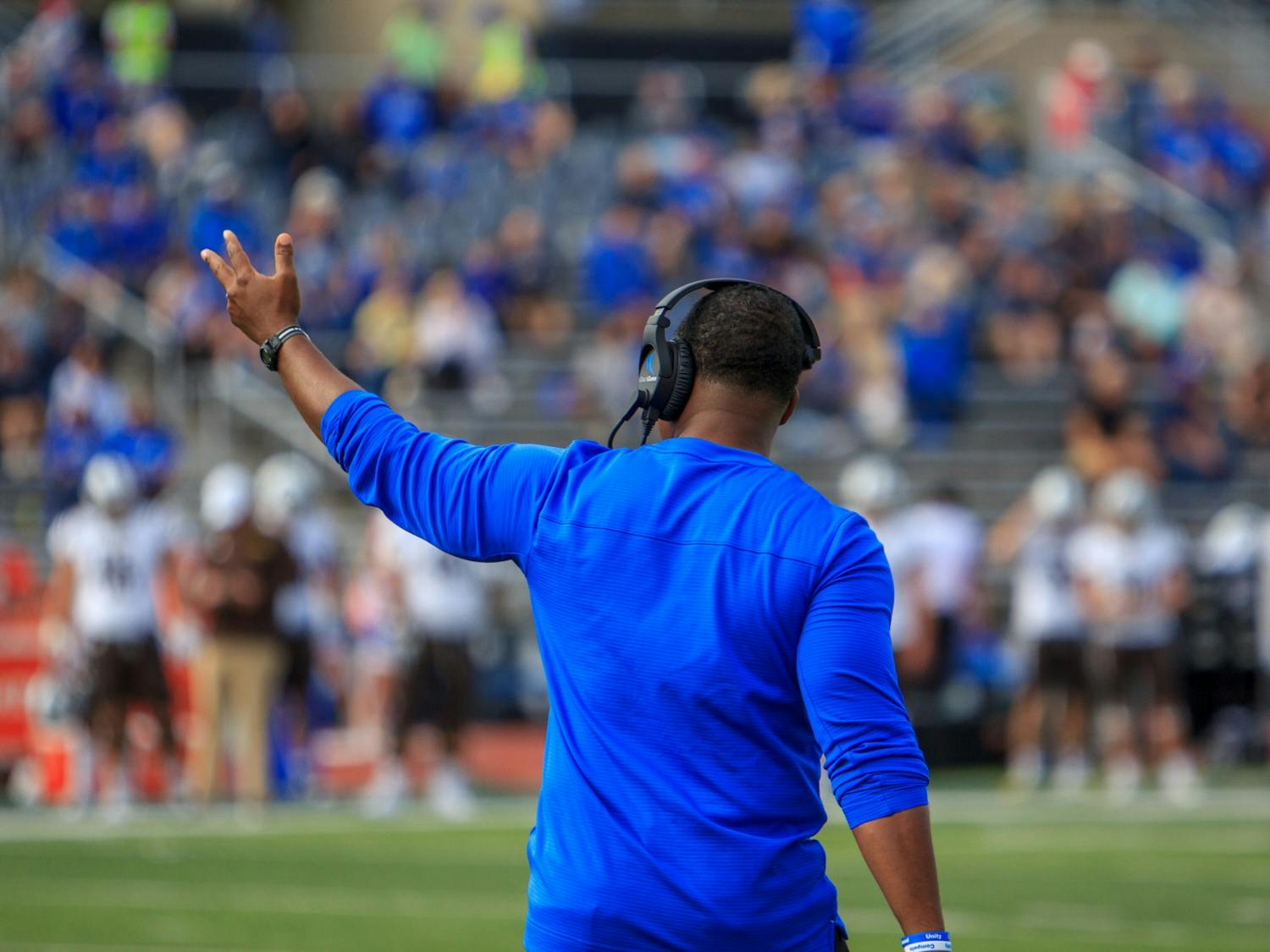 UB head coach Maurice Linguist gestures toward his players during an October game against Western Michigan.