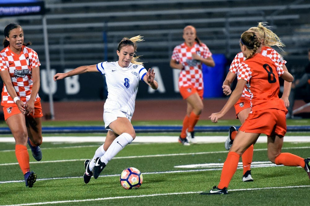 <p>Sophomore forward Carissima Cutrona takes on defenders. Cutrona is the leading scorer for the UB women's soccer team.&nbsp;</p>