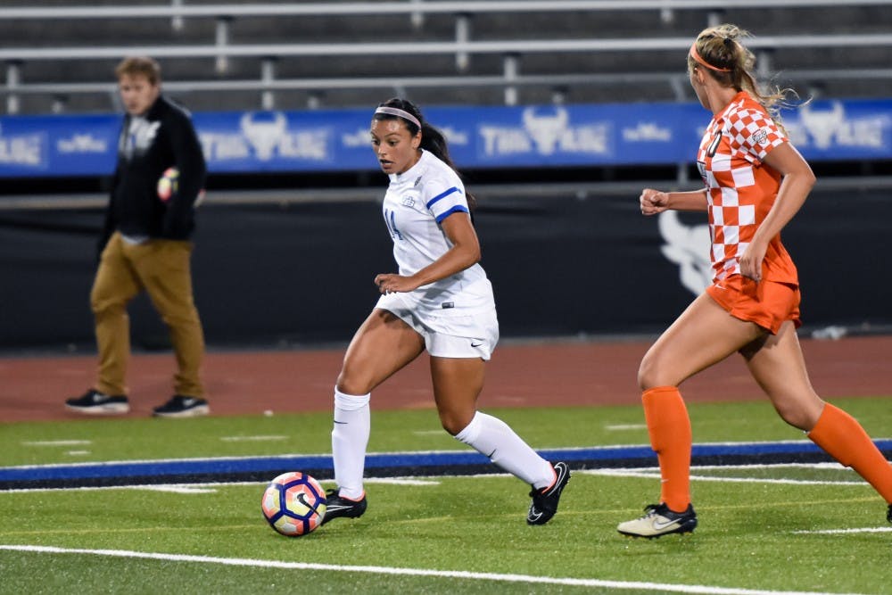 <p>Senior forward Celina Carrero gets passed a Bowling Green defender. Carrero scored the only goal against Akron for Thursday's win, which&nbsp;qualified them for another MAC Tournament.</p>