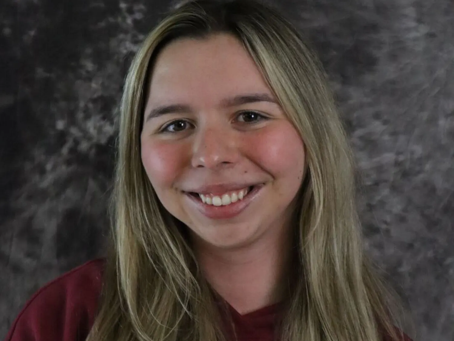 A headshot of staff writer Emma Schneeberger
