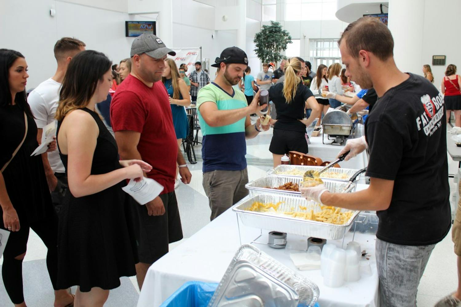 There were 11 competitors in the "Mac Attack" competition, including Mooney’s, The Press Box and Protocol Restaurant. The event was held in CFA seating area, with vendors lining the walls serving small cups of mac and cheese to attendees.