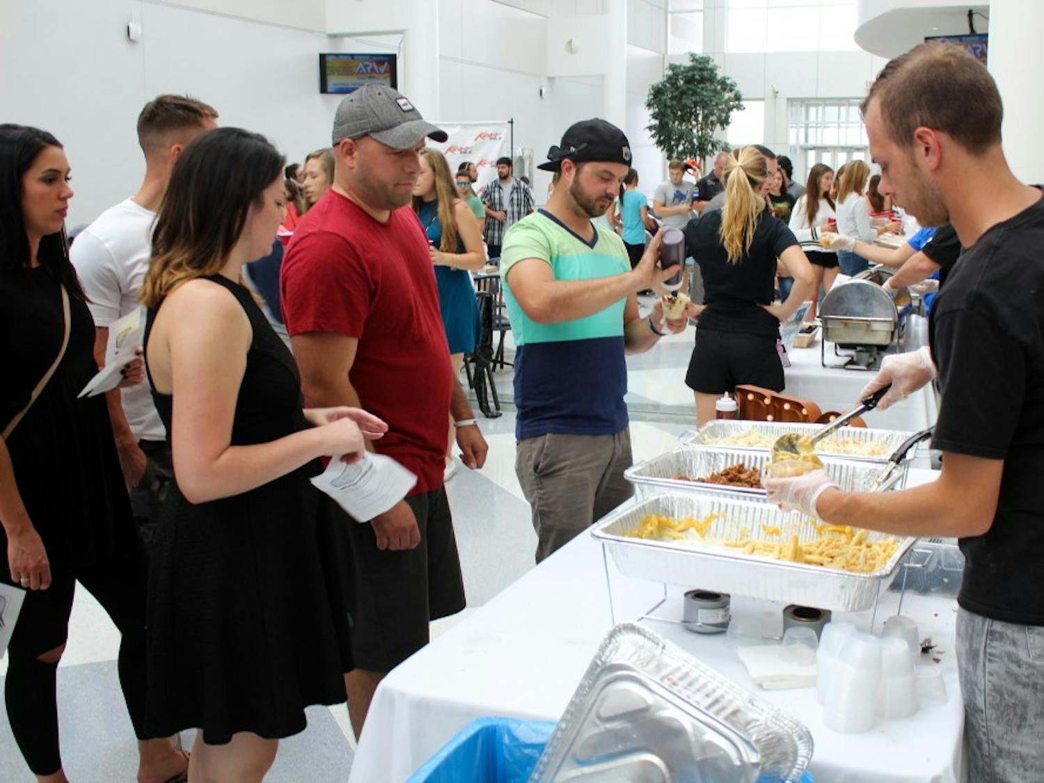 There were 11 competitors in the "Mac Attack" competition, including Mooney’s, The Press Box and Protocol Restaurant. The event was held in CFA seating area, with vendors lining the walls serving small cups of mac and cheese to attendees.
