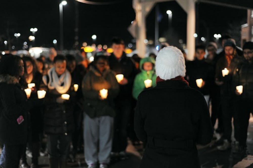 Approximately 85 students stood outside the Student Union Friday to remember the three Muslim North Carolina students who were shot and killed last week.&nbsp;Yusong Shi, The Spectrum