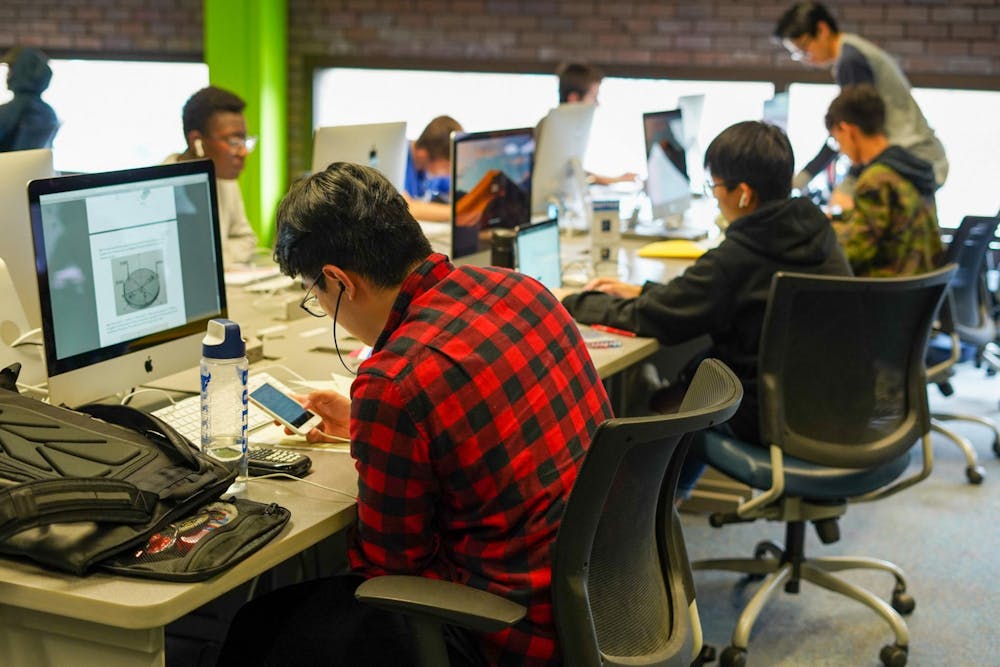 <p>Students using computers at the Lockwood Cybrary.</p>