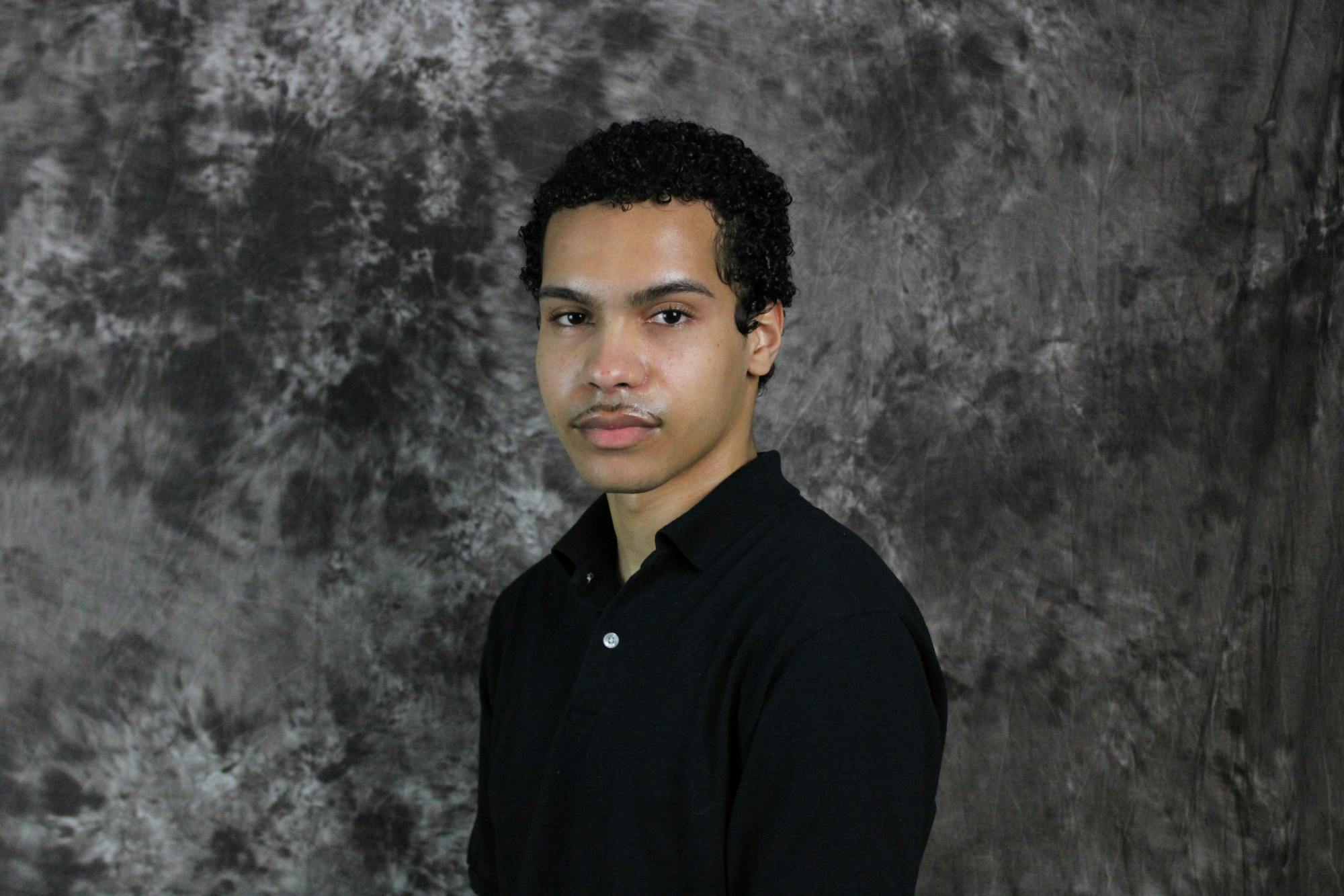 Headshot of Alejandro Henry-Jackson. 