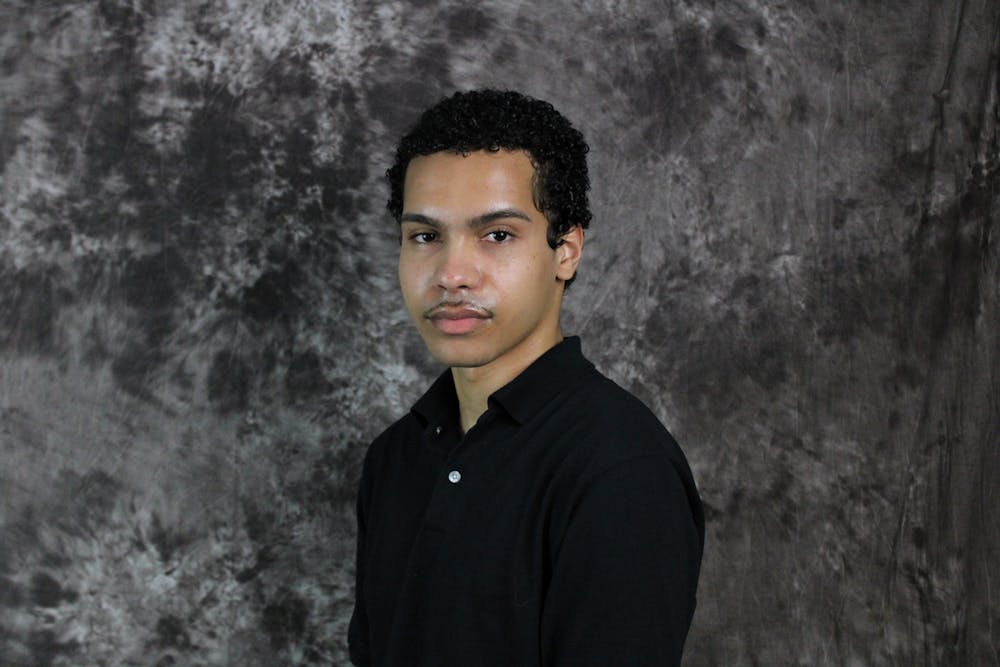 Headshot of Alejandro Henry-Jackson. 