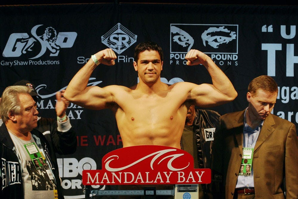 <p>Joe Mesi celebrates as he wins by KO. Mesi is a former heavyweight boxer and is considered an icon of Buffalo sports.&nbsp;</p>