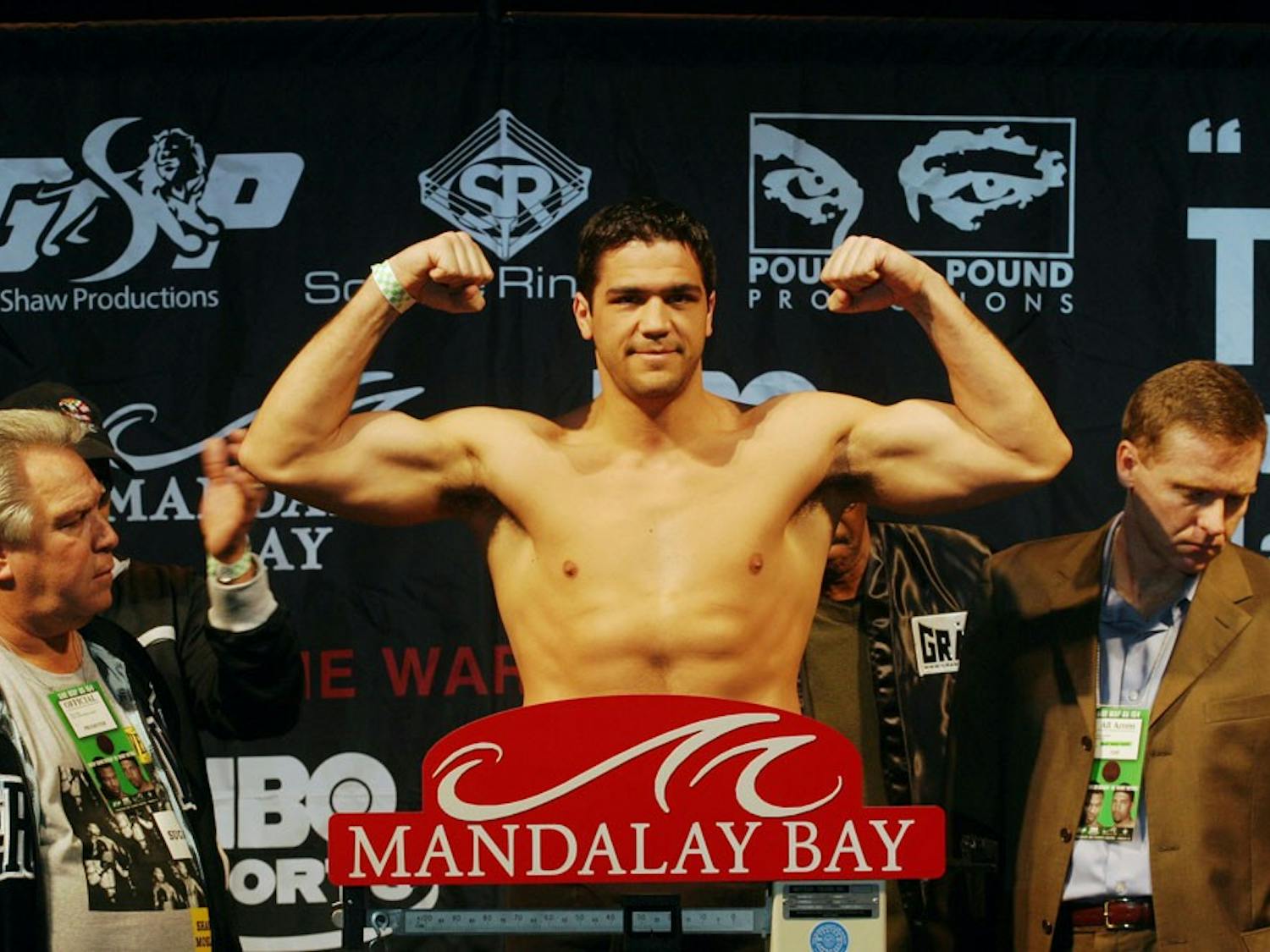 Joe Mesi celebrates as he wins by KO. Mesi is a former heavyweight boxer and is considered an icon of Buffalo sports. 