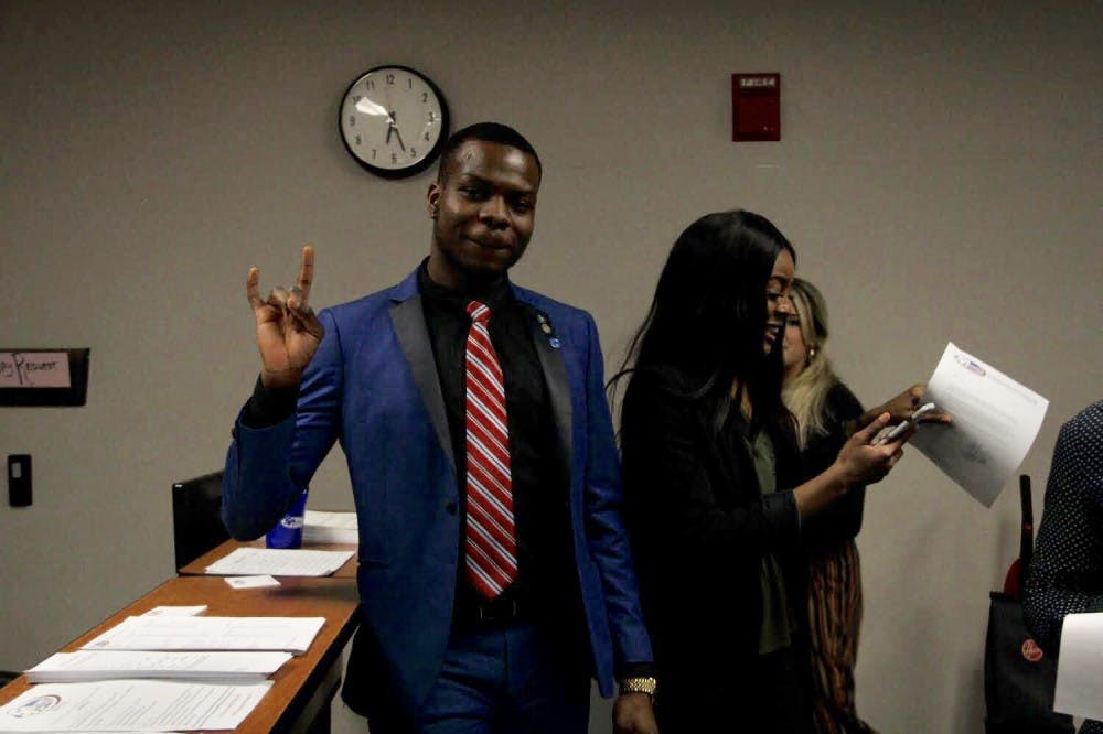 <p>2019-20 Student Association President-elect Yousouf Amolegbe poses for a photo moments after winning the executive board election Thursday.</p>