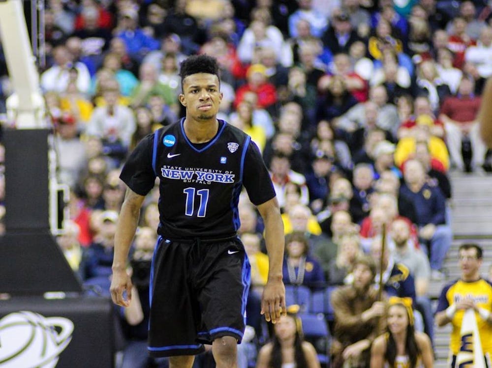 <p>Sophomore guard Shannon Evans in Buffalo's NCAA Tournament game against West Virginia last March. An image of&nbsp;Evans, who transferred to Arizona State, was taken down and replaced from the Alumni Arena lobby wall.&nbsp;</p>