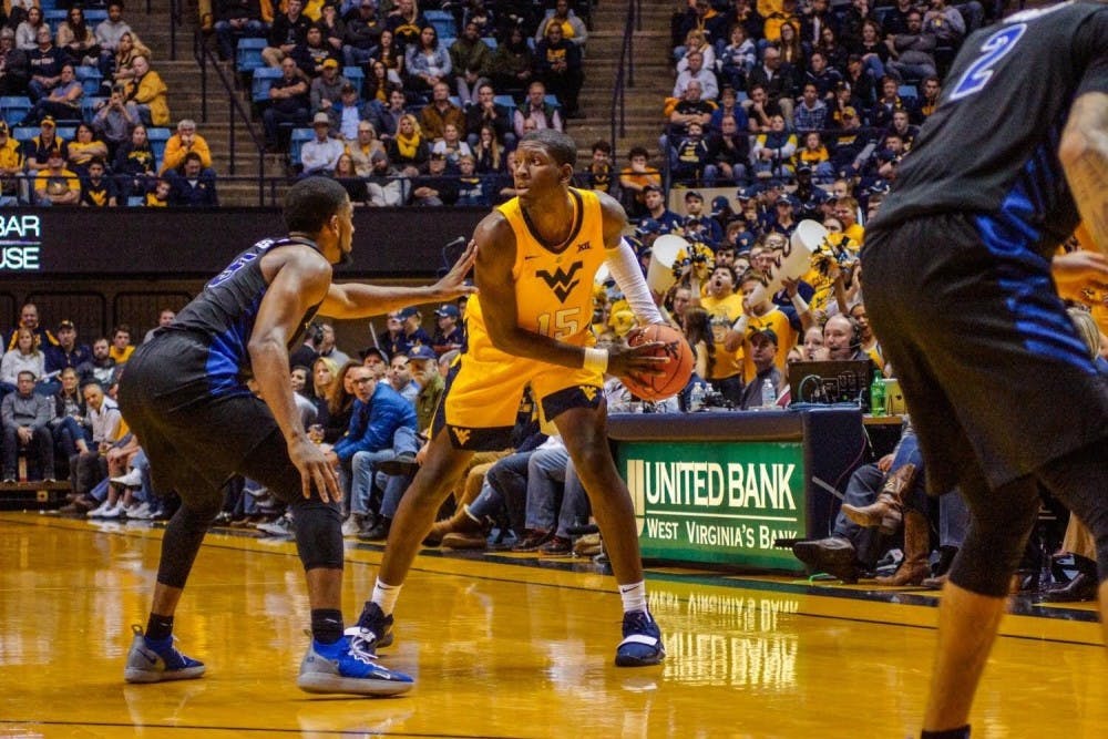 <p>Senior guard CJ Massinburg defends West Virginia’s Lamont West. Massinburg finished with a career-high 43 points and 9 three-pointers.&nbsp;</p>