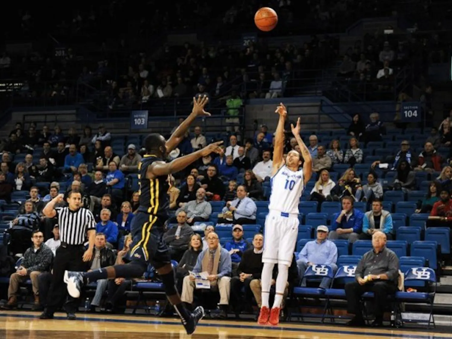 Junior guard Jarryn Skeete hits one of his four three-pointers Tuesday night. Skeete scored 14 points as the Bulls defeated Drexel 80-70. Yusong Shi, The Spectrum. 