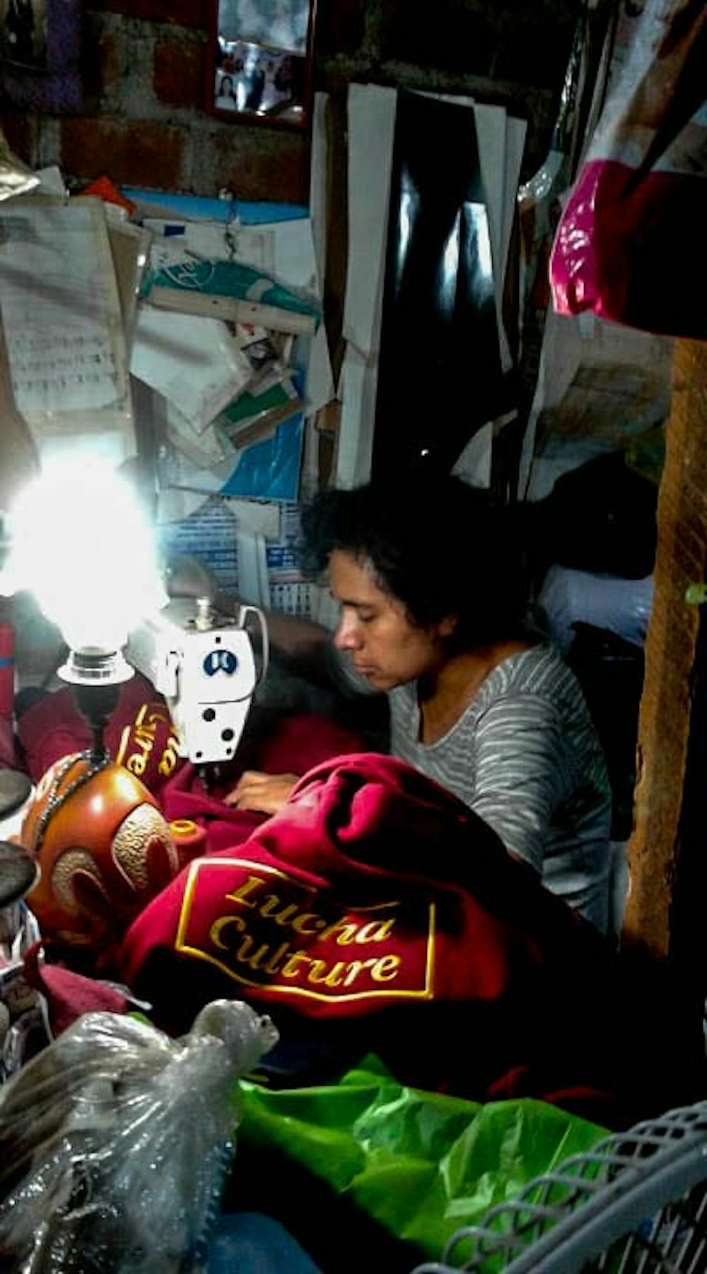 <p>All of Dylan Rosales’ clothing line is made in Peru. Pictured here, his manufacturer stitches his most recent releases: black and red Inca chakana hoodies.</p>