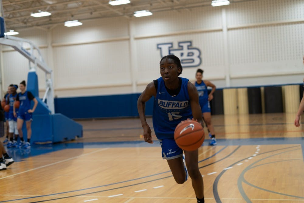 <p>Sophomore Oceane Kounkou dribbling the ball during a practice session.</p>