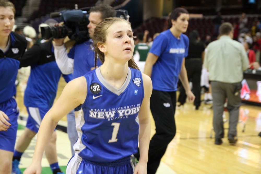 <p>Stephanie Reid is emotional after the Bulls' 63-55 loss to No. 1 Ohio in the semi-finals of the Mid-American Conference Tournament on Friday. </p>