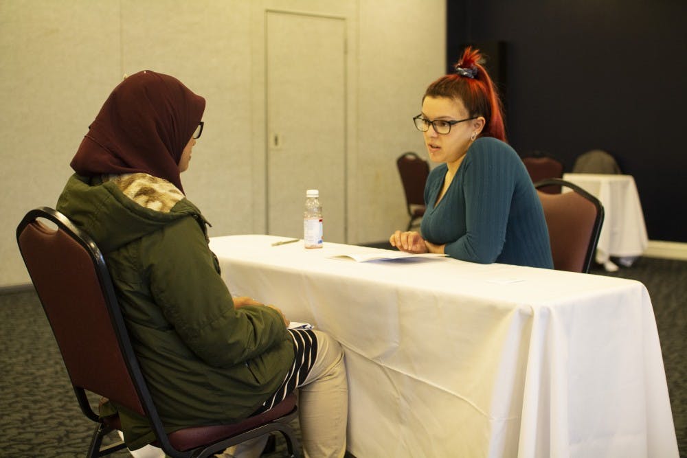 <p>Speakers doing one-on-one sessions as part of UB’s Human Library event. The idea of the event is to have people share first-hand experiences.</p>