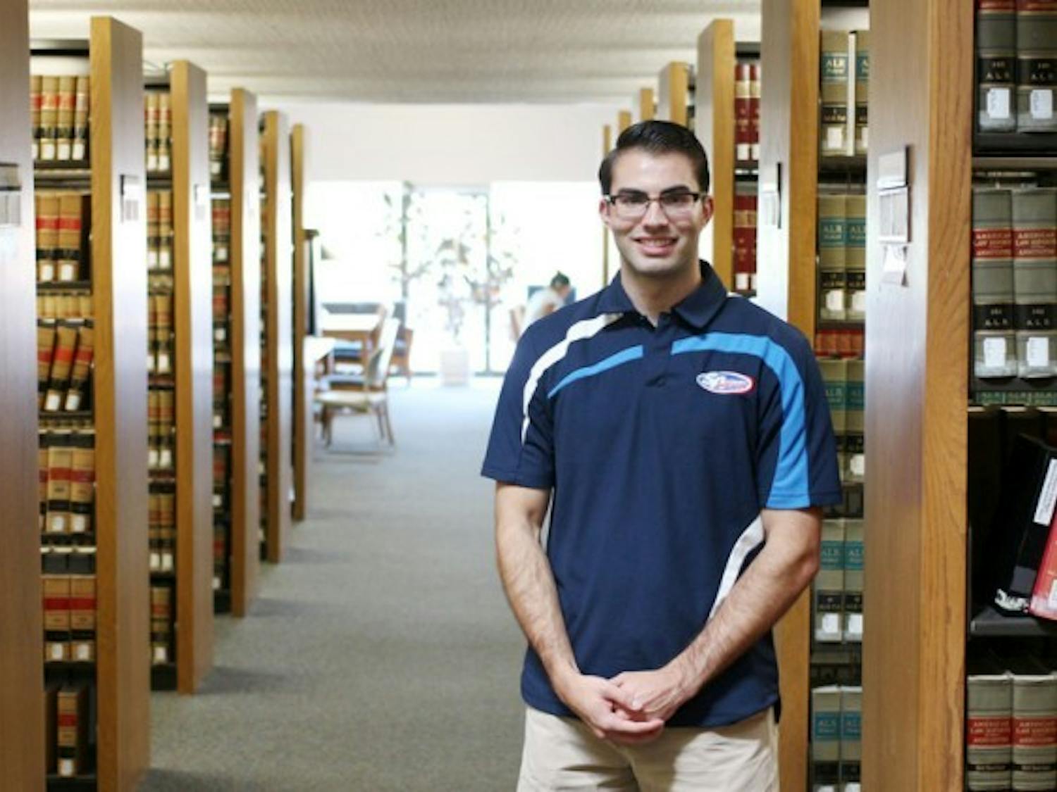 Student Association President James Ingram is driven by his goals of a successful future, which includes studying for the LSATs to attend a prestigious law school and working to accomplish his SA ideas. He also balances his workload with moments of good-natured humor with those close to him. Ingram’s profile Yusong Shi, The Spectrum