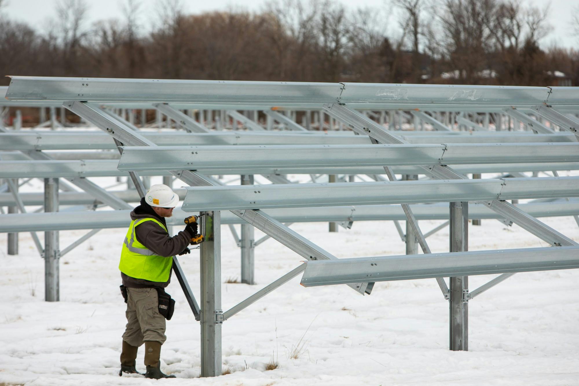 Workers installed a section of the Solar Stroll, located to the east of Millersport Highway, in February.