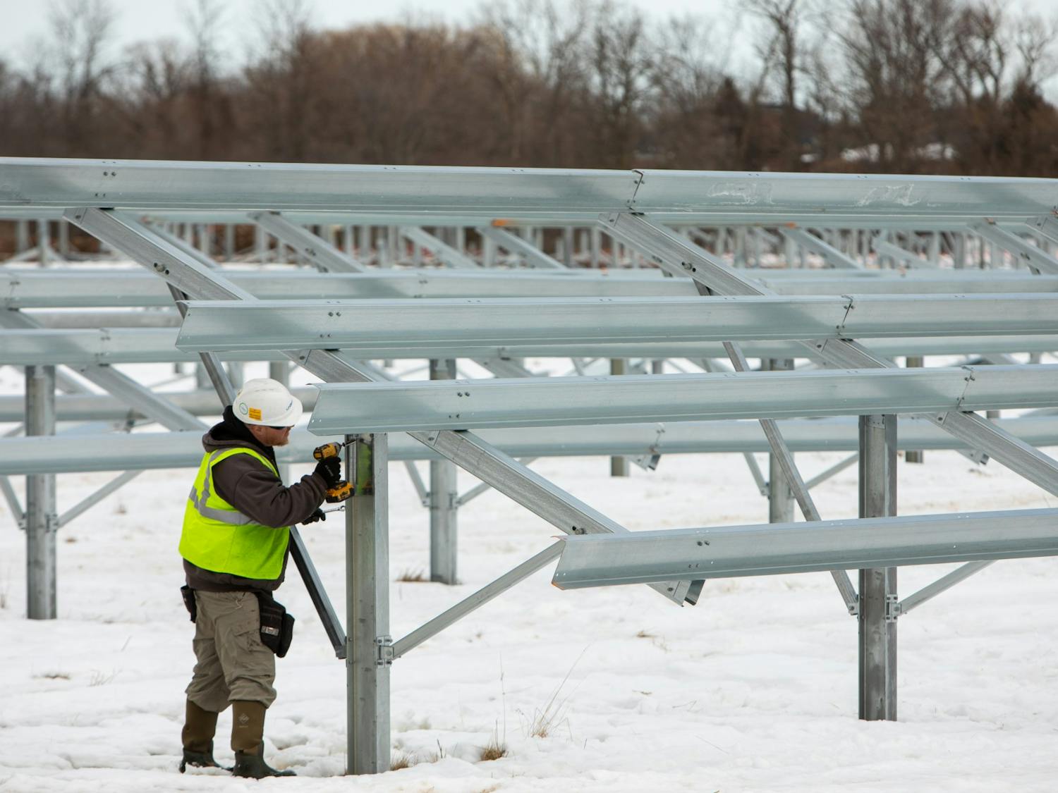 Workers installed a section of the Solar Stroll, located to the east of Millersport Highway, in February.
