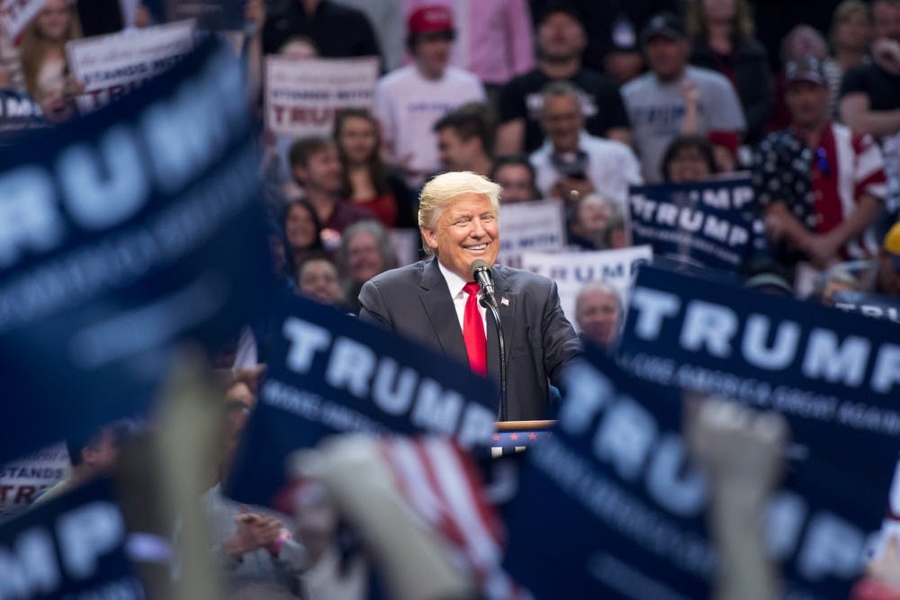 <p>President Donald Trump speaks at Trump rally in downtown Buffalo in April 2016. Trump has issued seven executive orders, 11 presidential memorandums and two presidential proclamations as of Jan. 30.</p>