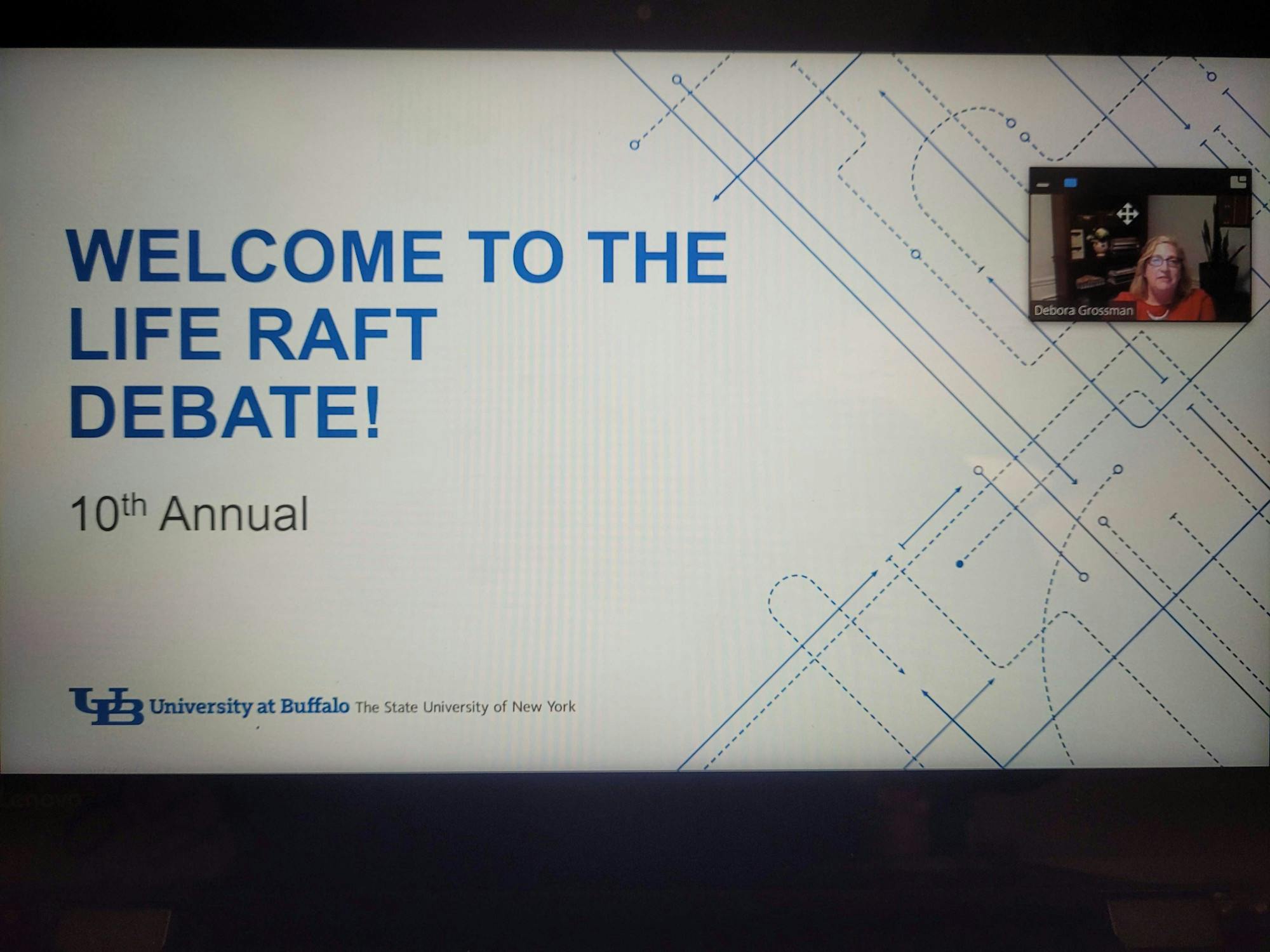 Debora Grossman, assistant professor in UB's School of Management, speaks to the audience during the UB Life Raft Debate Wednesday.