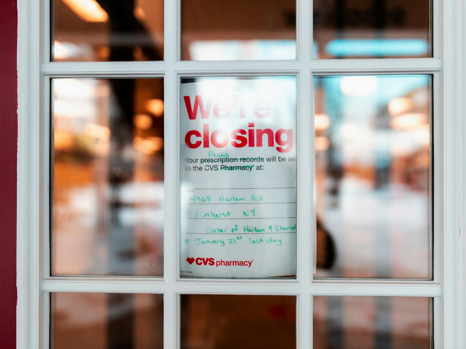 A sign nestled in CVS’ doorway displays the store’s fate.