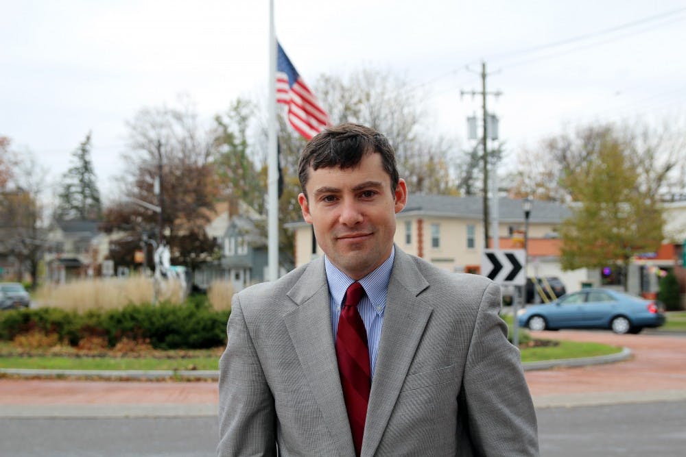 <p>Sean Bunny stands in the village of East Aurora. Bunny is running for Congress against Republican incumbent Chris Collins.</p>