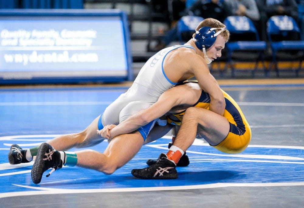 <p>Sophomore Bryan Lantry wrestles an opponent. Lantry will wrestle at NCAA Championships this weekend.</p>