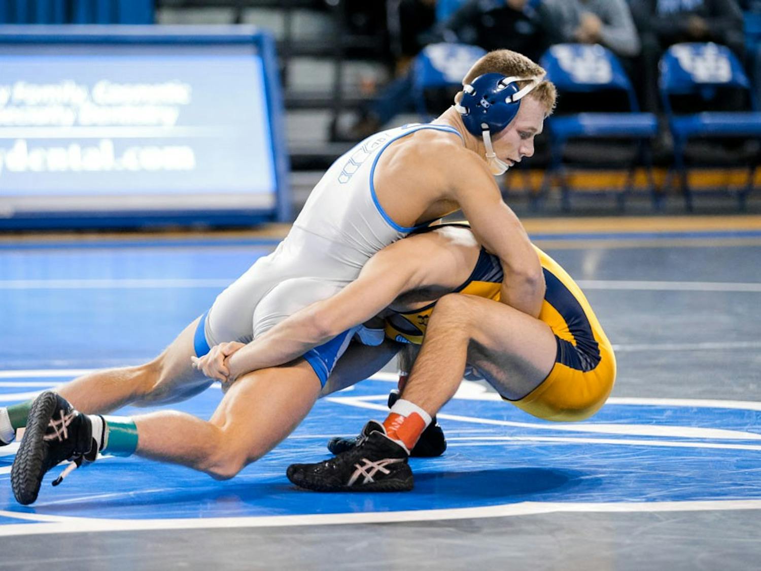 Sophomore Bryan Lantry wrestles an opponent. Lantry will wrestle at NCAA Championships this weekend.