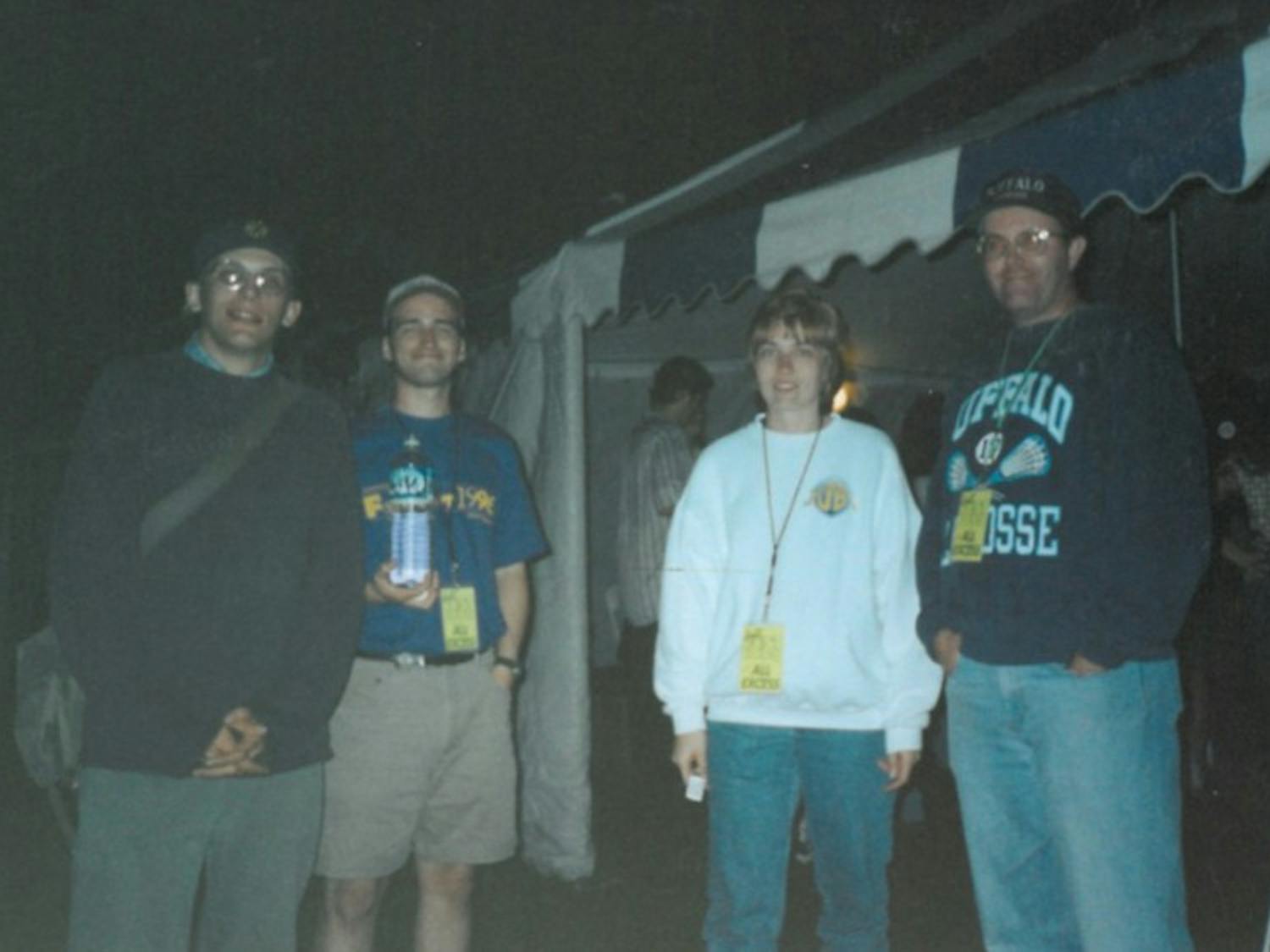Courtesy of Kim Greenfield/ Kim Greenfield poses with UUAB staff backstage at Fall Fest 1996 at Baird Point. Greenfield was director of UUAB in 1993 when she helped her student staff bring Nirvana to campus.&nbsp;