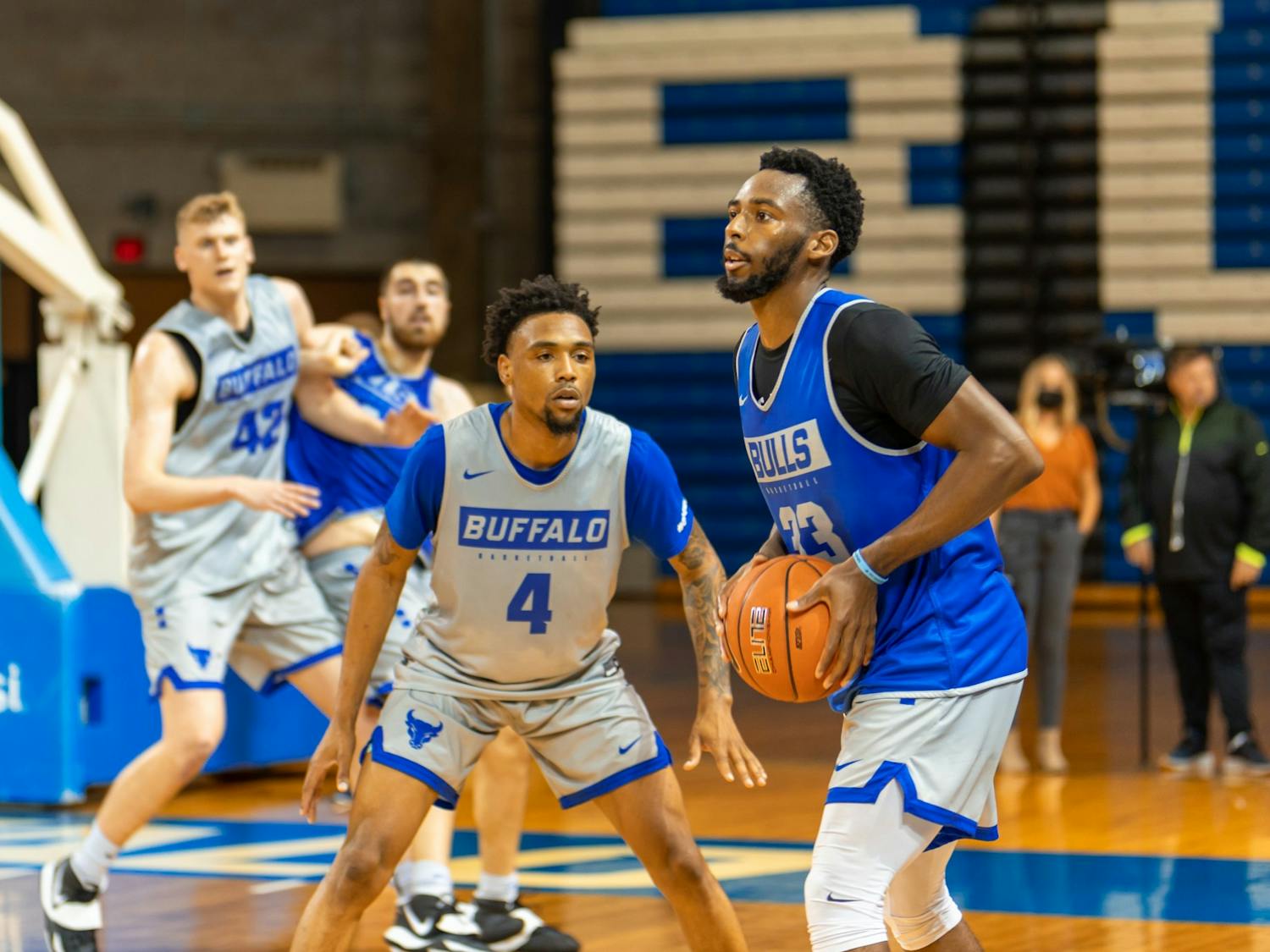 UB guard Maceo Jack (33) is guarded by guard Keishawn Brewton (4) at men’s basketball practice last week.