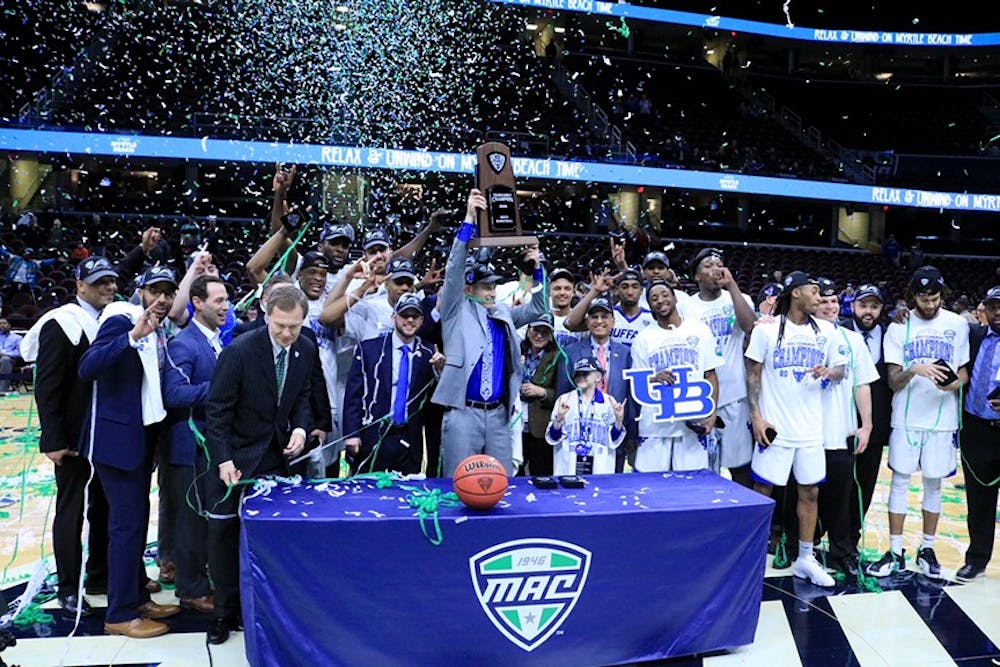 <p>The men’s basketball team celebrates their MAC Title victory in Quicken Loans Arena. The MAC Title ranks third on The Spectrum’s list of top 10 events in March.</p>