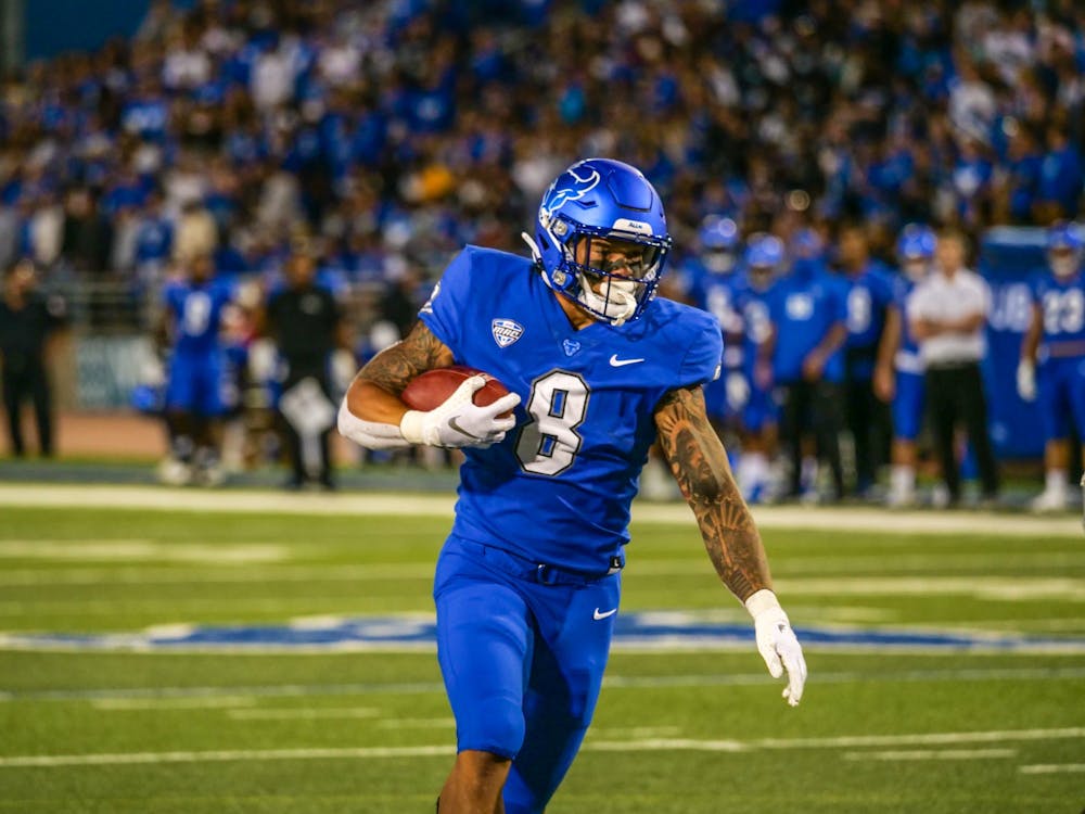 UB running back Dylan McDuffie (8) rushed for 27 yards and two touchdowns on Thursday night.