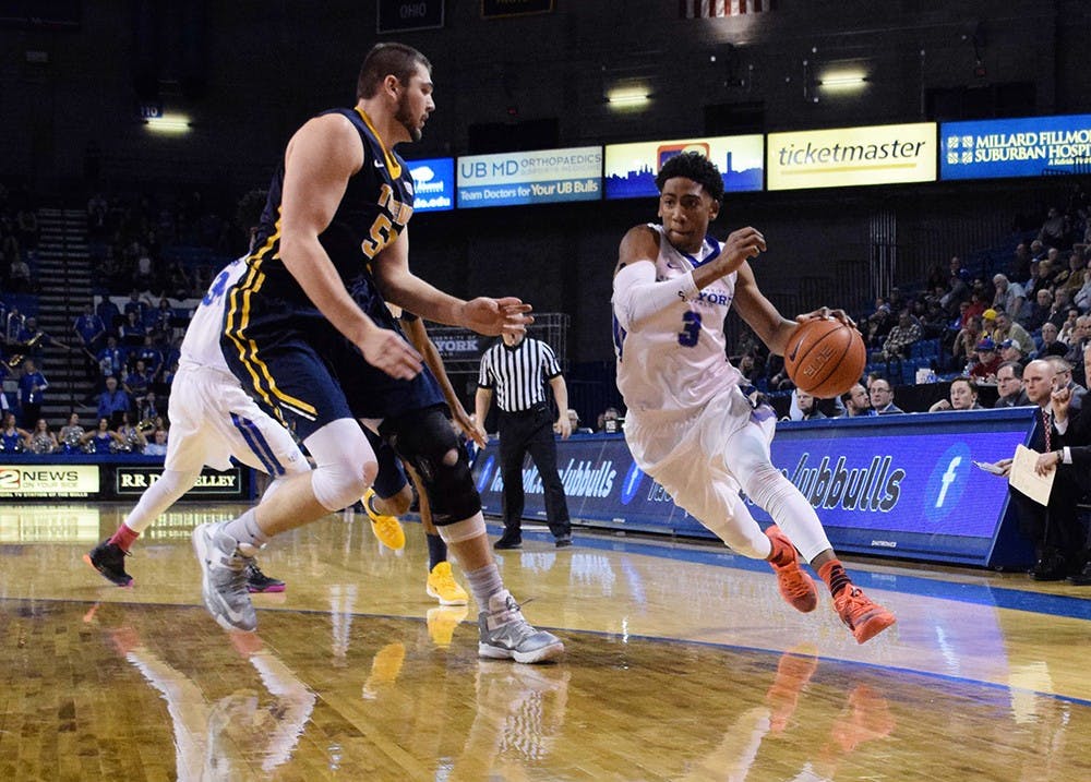 Freshman guard CJ Massinburg looks to go to the basket against Toledo on Feb. 9. Massinburg&nbsp;was named to the All-MAC Freshman Team.&nbsp;