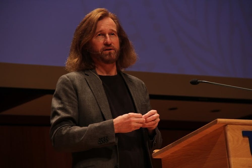 <p>Pulitzer Prize-winner Tom Toles speaks to the audience. Toles, a UB and <em>Spectrum </em>alumnus,&nbsp;visited UB Thursday as part of UB's fourth annual Signature Series.</p>
