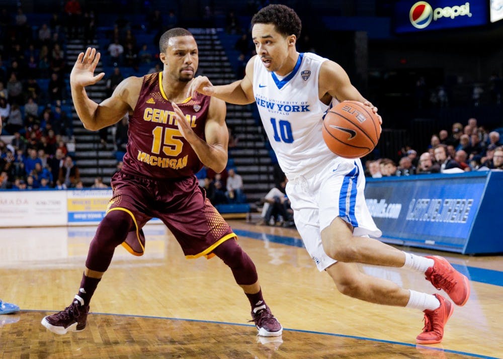 <p>Senior guard Jarryn Skeete (right) drives to the basket against Central Michigan guard Chris Fowler (left) in Buffalo's 74-61 victory over the Chippewas in Alumni Arena Saturday. Skeete ran the point for Buffalo with sophomore guard Lamonte Bearden out of the lineup with a foot injury.&nbsp;&nbsp;</p>
