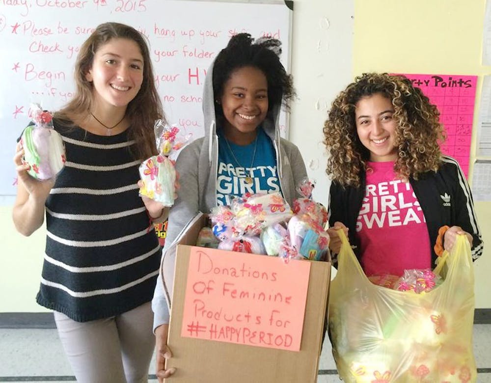 <p>Kathryn McSpedon and other members of the #HappyPeriod cause contribute boxes of period supplies for homeless women around Buffalo.</p>