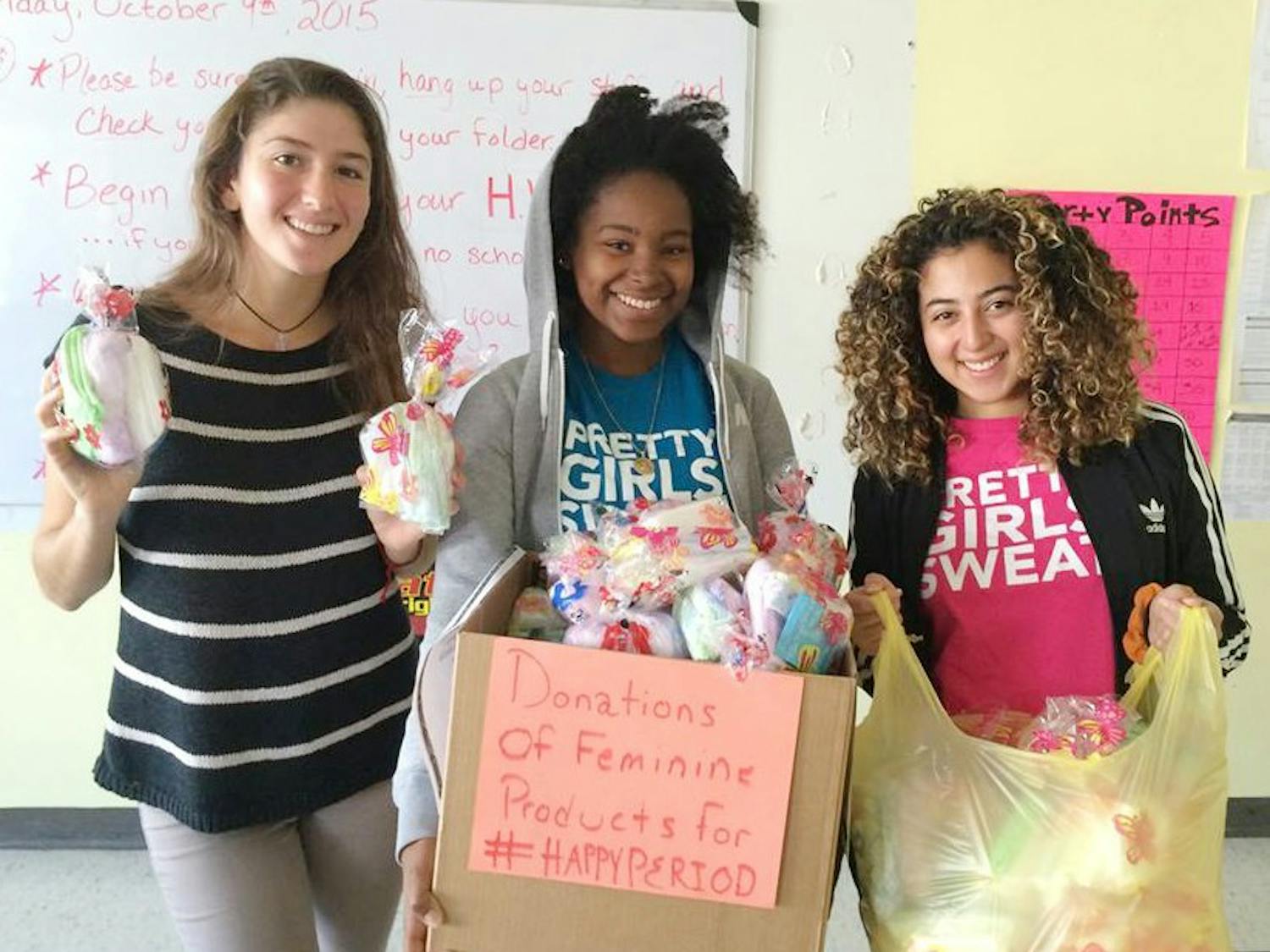 Kathryn McSpedon and other members of the #HappyPeriod cause contribute boxes of period supplies for homeless women around Buffalo.