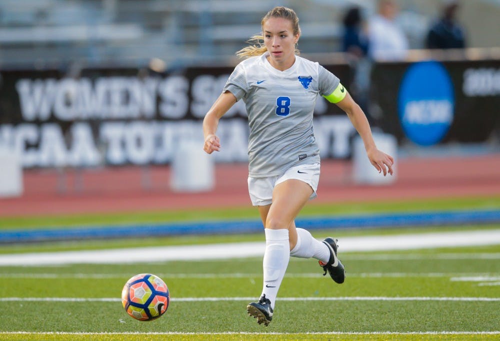 Senior forward Carissima Cutrona dribbles through the midfield. Cutrona leads the team with nine points on the season, including three goals in her past two games.