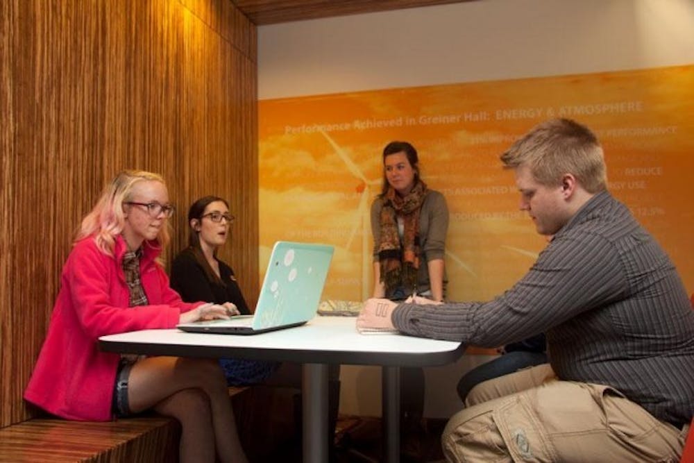 <p>Kelsey Habla, president of Love is the Movement Interest Club, meets with other e-board members in Greiner Hall. The club is based off of the the national non-profit To Write Love on Her Arms, a movement dedicated to helping those struggling with depression, addiction and self-harm.</p>