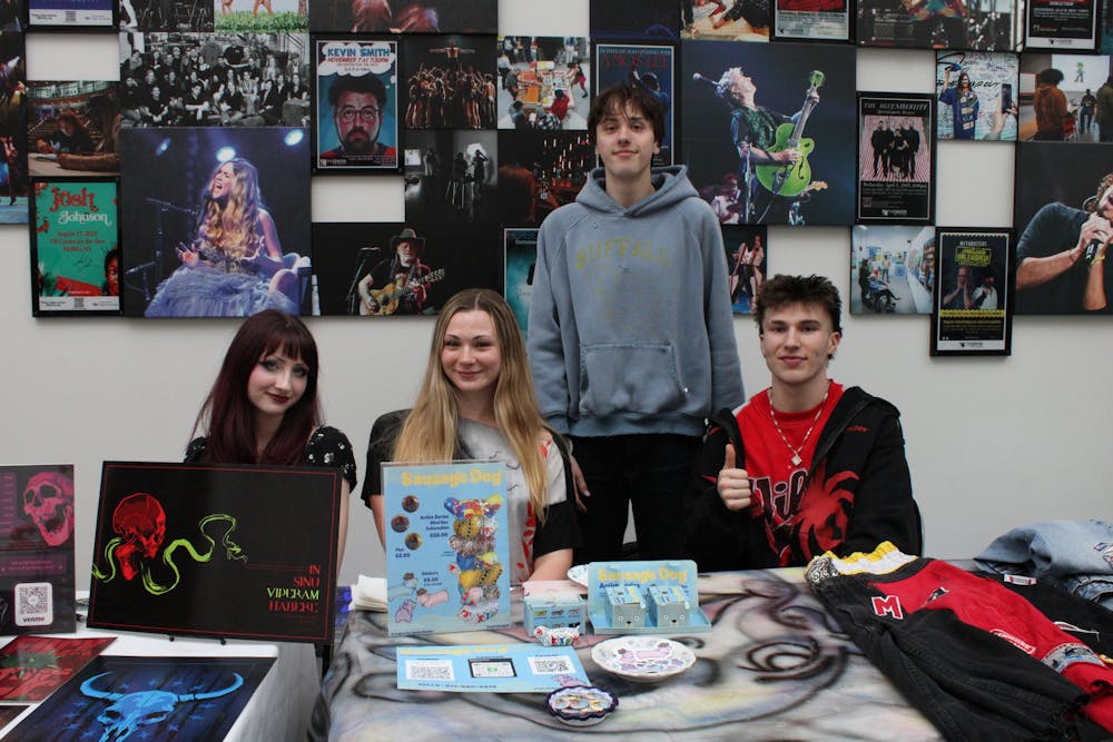 Left: Emma Anders and Sylvie Deuber, Studio Art Students. Right: Markus Phillps, Founder of Inna coma, and Ty Zizzi, Founder of Beau Garçon