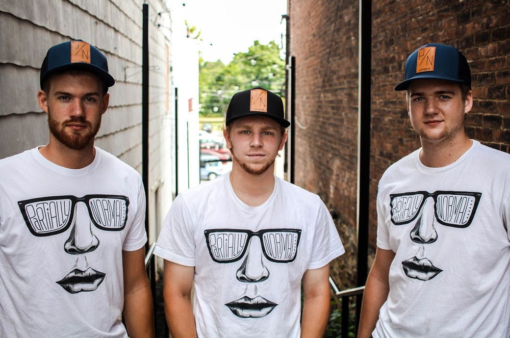 <p>Brendan Cox, Ryan Thompson and Evan Cox the creators of Partially Normal Clothing. They currently have hats and t-shirts for sale but plan to include hoodies in their upcoming fall lineup.</p>