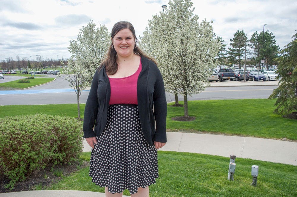 <p>Hilary Vandenbark, Ph.D candidate, stands outside of Alumni Arena. Vandenbark is a sexual assault survivor and wants administration to be more transparent when discussing sexual assault on campus.</p>