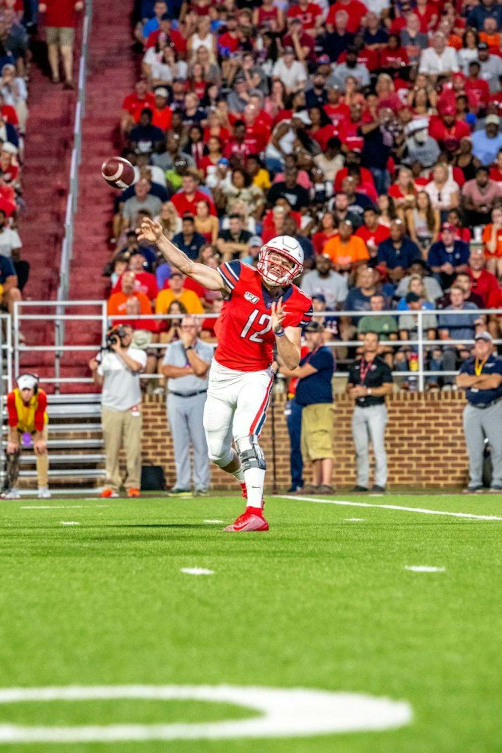 <p>Liberty Quarterback Stephen Calvert throws a pass.</p>